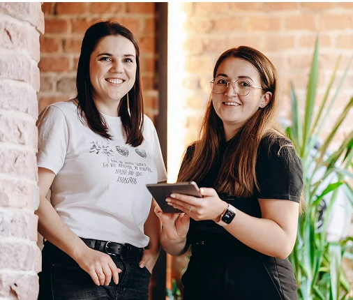 Two SapientPro colleagues in the office